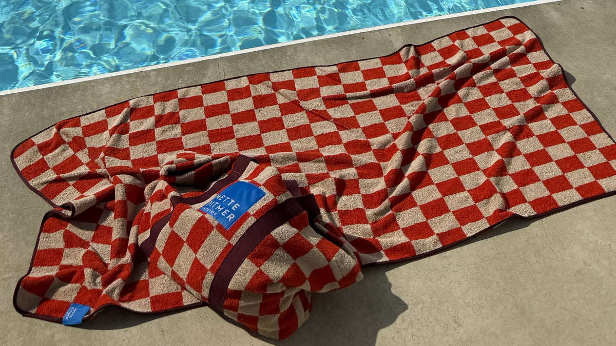 Strandhåndklæder og strandtasker